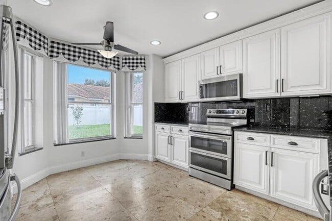 5877 Las Colinas Cir in Greenacres, FL - Building Photo - Building Photo