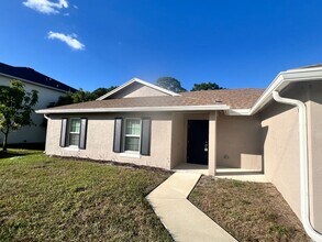 5951 NW Baynard Dr in Port St. Lucie, FL - Building Photo - Building Photo