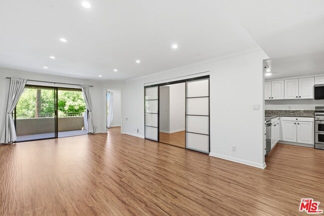 property at 5009 Woodman Ave