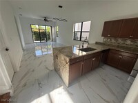 5458 Useppa Dr in Ave Maria, FL - Foto de edificio - Building Photo