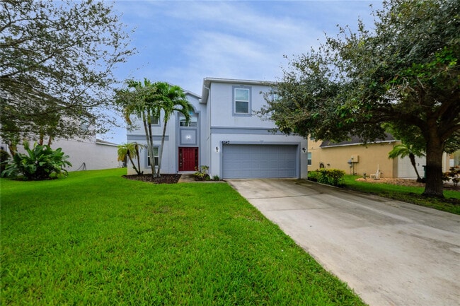 6147 NW Butterfly Orchid Pl in Port St. Lucie, FL - Building Photo - Building Photo