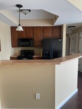 5100 Tesson Gardens Ct, Unit 2B in St. Louis, MO - Building Photo - Building Photo