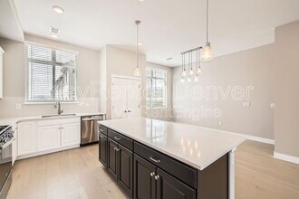 15592 W Warren Ave in Lakewood, CO - Building Photo - Building Photo