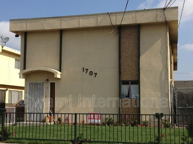 property at 1707 W 144th St