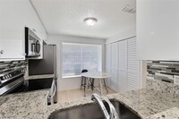 4905 Silver Oaks Village, Unit GE in Orlando, FL - Building Photo - Building Photo