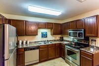 Modern Kitchen with Stainless Appliances - Ashford Place Apartments in West Monroe, Louisiana