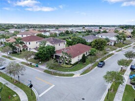 9741 S Miralago Way in Parkland, FL - Building Photo