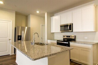 12810 Siena Vlg Ln in Mustang Ridge, TX - Building Photo - Building Photo