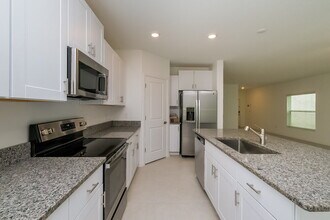 7310 Spring Snowflake Ave in Palm River-Clair Mel, FL - Building Photo - Building Photo