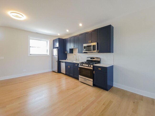 4409 N Seeley Ave, Unit 2020-2B in Chicago, IL - Foto de edificio - Building Photo
