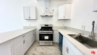 16023 Wyandotte St in Los Angeles, CA - Building Photo