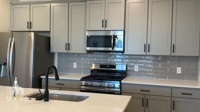 6153 N Ceylon St, Unit 10-308 in Denver, CO - Building Photo - Building Photo