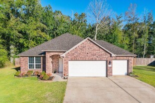 99 Rd 6605 in Dayton, TX - Building Photo