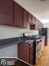949 W Cornelia Ave, Unit 3A in Chicago, IL - Building Photo - Building Photo