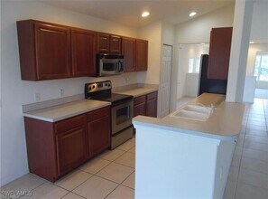 1355 Henley St in Naples, FL - Building Photo - Building Photo