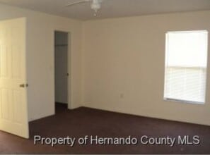 9358 Swiss Rd in Spring Hill, FL - Building Photo - Building Photo