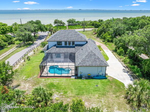 6725 S Tropical Trail in Merritt Island, FL - Building Photo - Building Photo