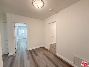 115 N Clark Dr in Beverly Hills, CA - Building Photo - Building Photo
