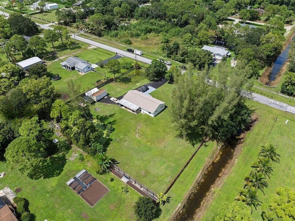 14754 Citrus Grove Blvd in The Acreage, FL - Building Photo