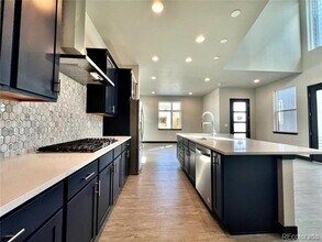 6064 N Perth St in Aurora, CO - Building Photo - Building Photo