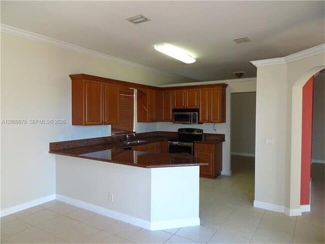 12830 SW 51st St in Miramar, FL - Building Photo - Building Photo