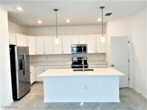 2611 Scarlet Wy in Naples, FL - Building Photo - Building Photo
