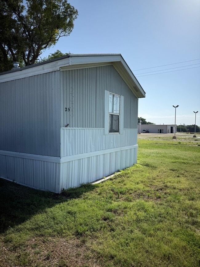 property at 204 E 1st St