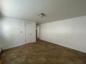 7722 W Belmont Ave, Unit GN in Chicago, IL - Foto de edificio - Building Photo