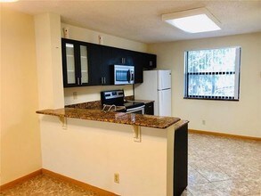 10131 W Sunrise Blvd-Unit -2J1 in Plantation, FL - Building Photo - Building Photo