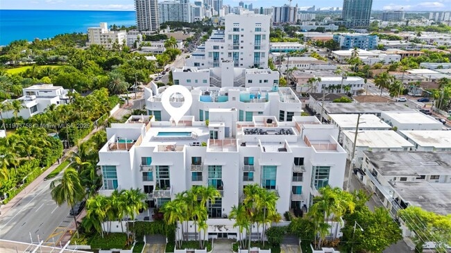 property at 7744 Collins Ave