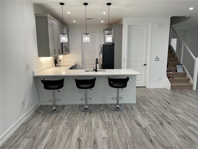 7630 Rockefeller Dr in Naples, FL - Foto de edificio - Building Photo