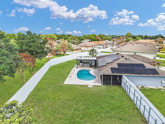 property at 702 NW Orchid St