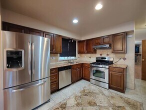 16456 E Kentucky Ave in Aurora, CO - Building Photo - Building Photo