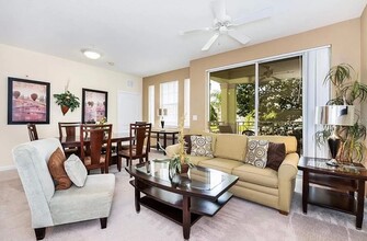 5267 Cane Island Loop-Unit -204 in Kissimmee, FL - Foto de edificio - Building Photo