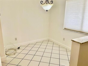 9587 Weldon Cir in Tamarac, FL - Building Photo - Building Photo