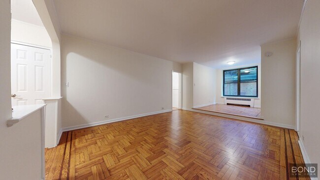property at 124 E 24th St
