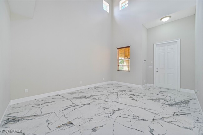 20609 E Golden Elm Dr in Estero, FL - Foto de edificio - Building Photo