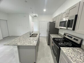 1243 Antonio St E in Lehigh Acres, FL - Building Photo - Building Photo