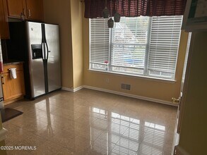 319 Bernard Dr in Morganville, NJ - Building Photo - Building Photo