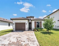 5627 Carrara Dr in Ave Maria, FL - Foto de edificio - Building Photo