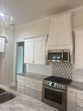 200 Windmill Palm Ln, Unit 13 in Youngsville, LA - Foto de edificio - Building Photo