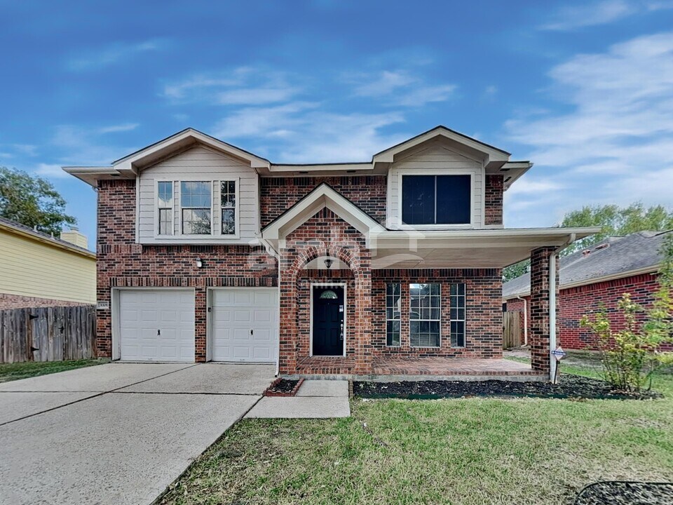 31106 Perlican Dr in Spring, TX - Foto de edificio