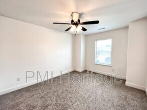 5909 NW Reynolds St in Bentonville, AR - Building Photo - Building Photo