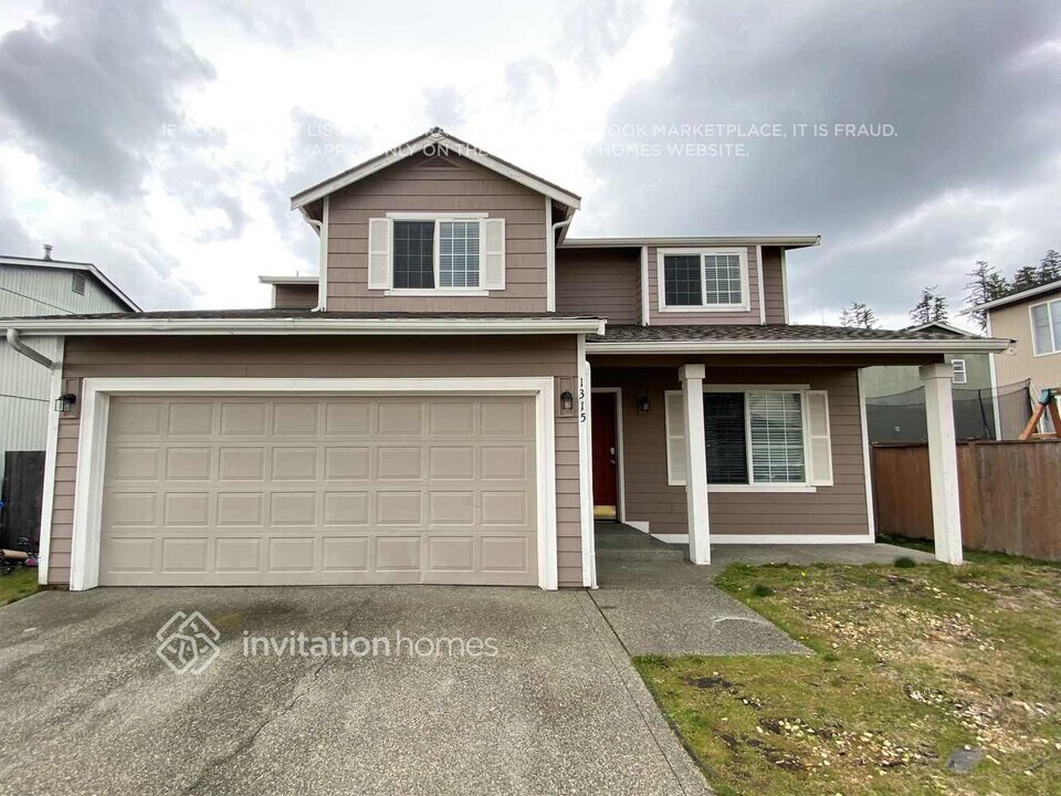 1315 201st St Ct E in Spanaway, WA - Building Photo