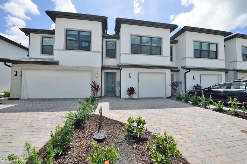 27839 Solis Grande Dr in Bonita Springs, FL - Building Photo
