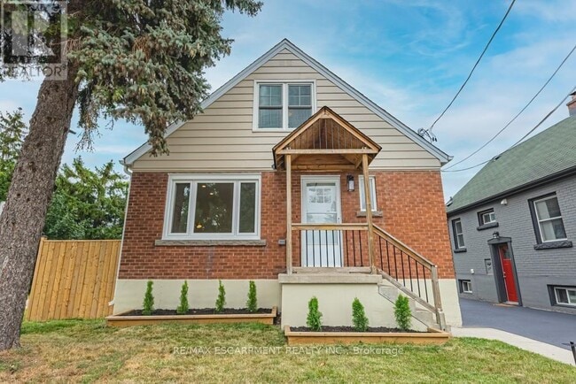 property at 587 Queensdale Ave E