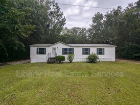 1298 Dunlevie Rd in Allenhurst, GA - Building Photo