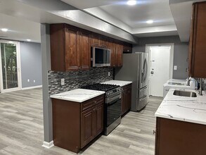 10246 Prince Pl, Unit 108 in Largo, MD - Building Photo - Building Photo