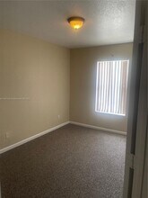 4203 Cohune Palm Ct in Greenacres, FL - Building Photo - Building Photo