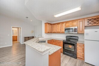 7667 N Wickham Rd, Unit 1419 in Melbourne, FL - Building Photo - Building Photo